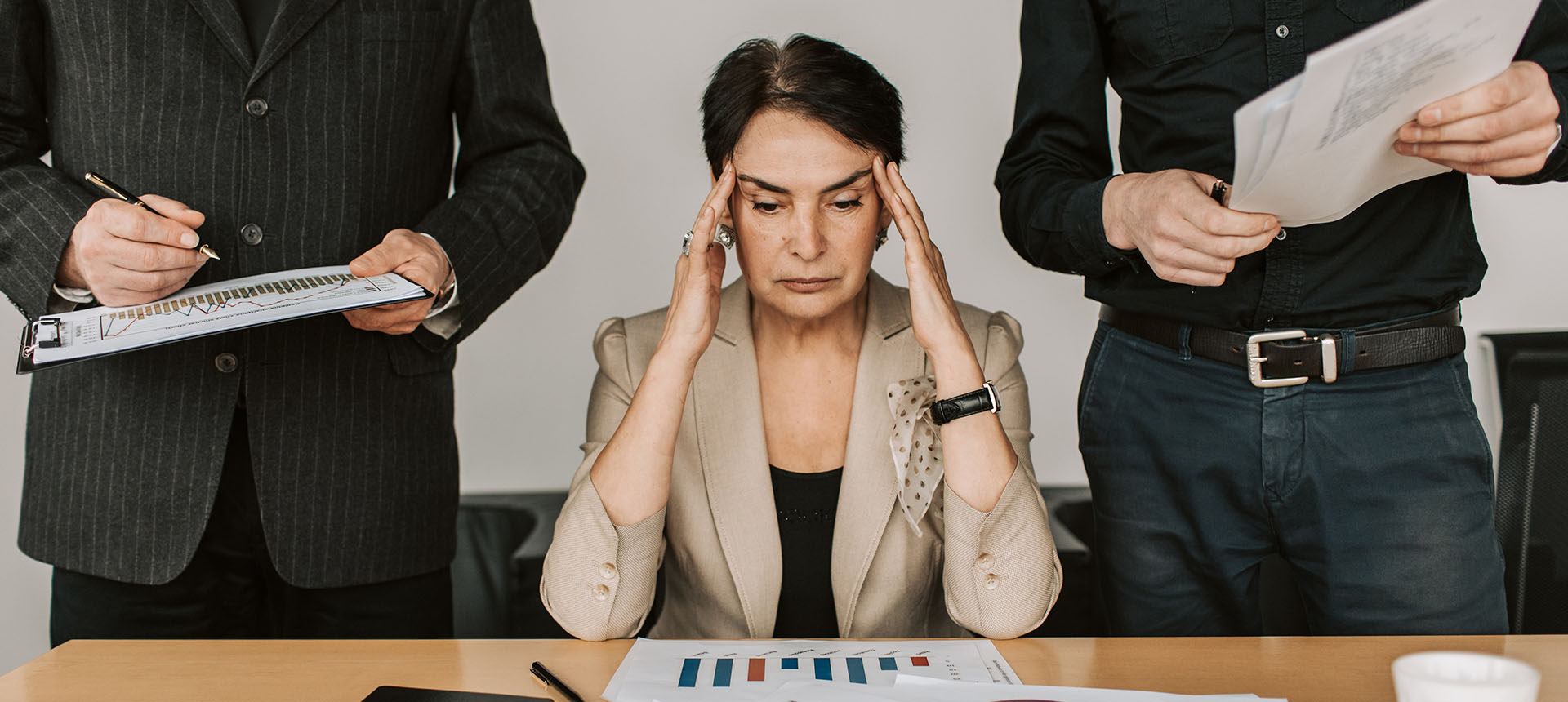 Stressed Elderly Woman Holding Her Head